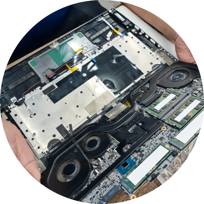computer technician disassembling mainboard with circuit laptop repairing upgrade technology
