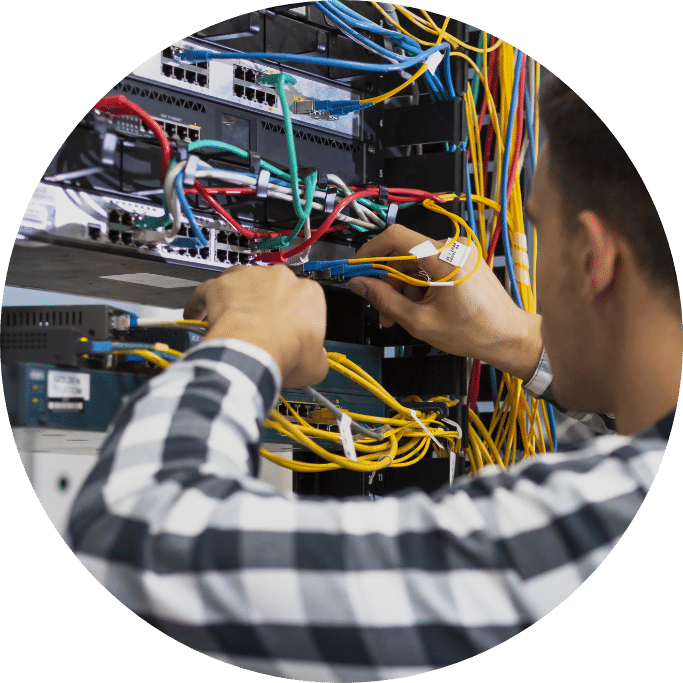 young man working ethernet switch